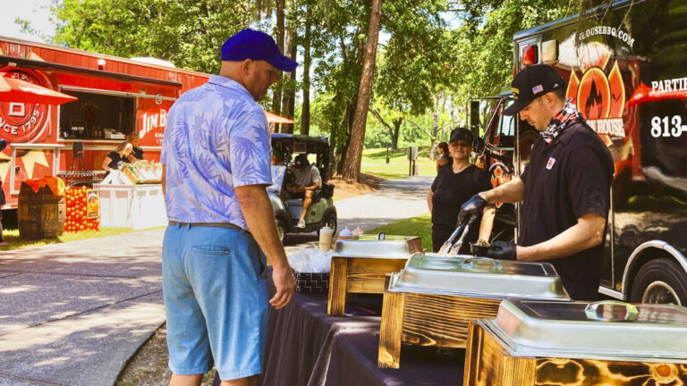 station-house-bbq-catering-staff-serving-guests-from-sidelines-of-starkey-ranch